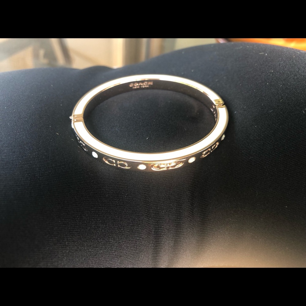 Beautiful Coach rose gold bangle bracelet.